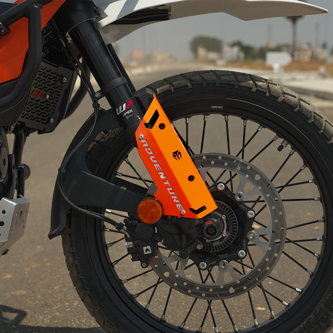 FORK PROTECTORS METAL - ORANGE    FOR  2025 FOR KTM 390 Adventure/Adventure X