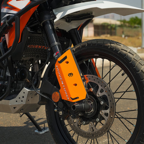 FORK PROTECTORS METAL - ORANGE    FOR  2025 FOR KTM 390 Adventure/Adventure X